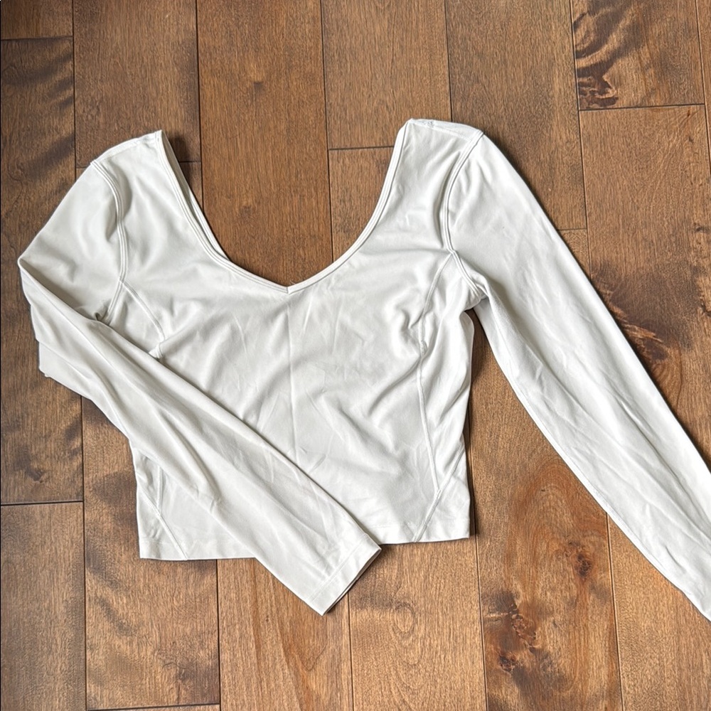 Lululemon Athletica White Fitted Long Sleeve Bodysuit